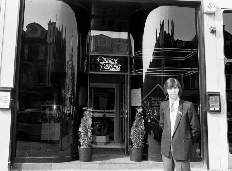 Manager Hugh McShannon stands outside the entrance to Charlie Parkers Restaurant and Cocktail Bar, George Street, September 1981 Photo: Hamish Campbell