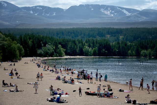 Loch Morlich, on the edge of Glenmore Forest in the Cairngorms National Park, became a popular destination for visitors as Scotland sizzled in the hottest day of the year on Spring Bank Holiday Monday. Picture: PA