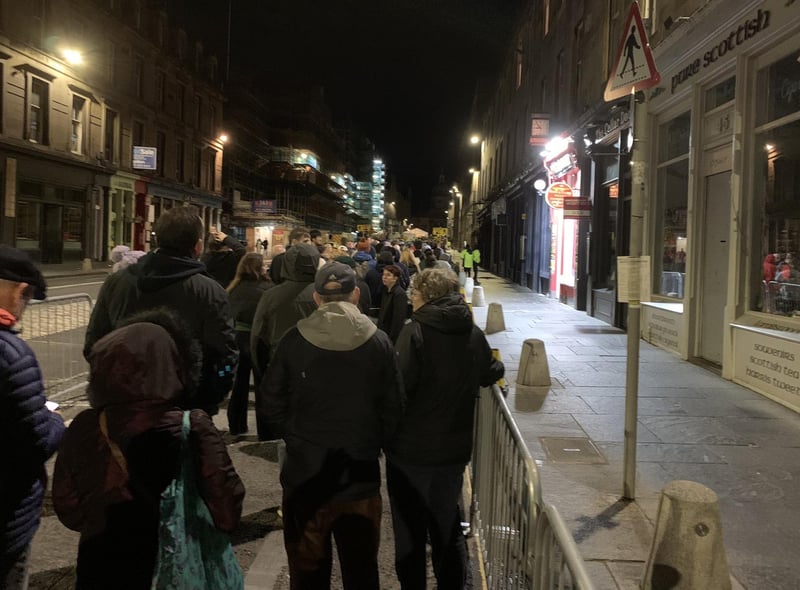 People waited into the night in Edinburgh to pay their respects to the Queen as she lies in state at St Giles' Cathedral. Picture date: Tuesday September 13, 2022.