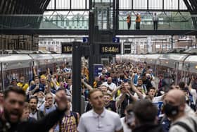 Scotland fans arrive at King's Cross Station on Thursday ahead of the England match.