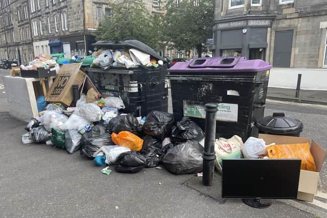 Bins in Edinburgh are spilling out onto the streets after 12 days of strikes by council workers. Picture: Ilona Amos