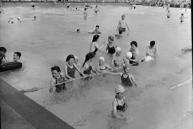 Children on their summer holidays enjoy Portobello Open Air Pool in 1959.
