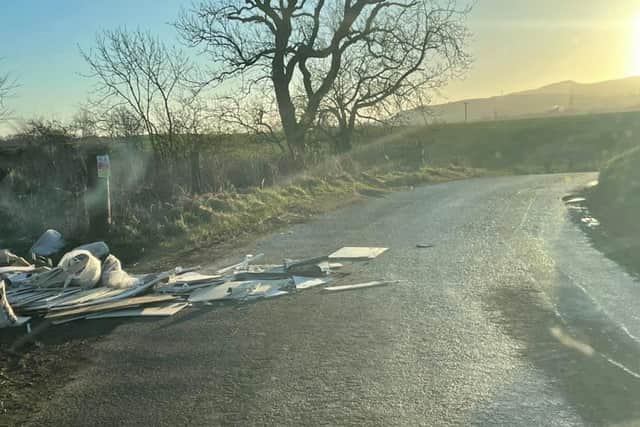 The flytipped waste spilled out onto the busy road