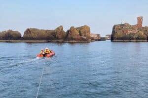 The Kerry Girl yacht being towed into Dunbar Harbour by the RNLI inshore lifeboat crew (Photo: Jamie Forrester)
