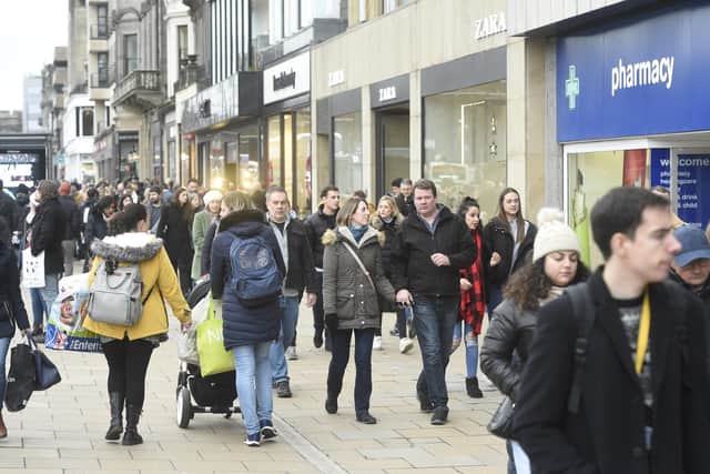 Shoppers on Princes Street: businesses are keen to see the crowds return. Photo: Greg Macvean.