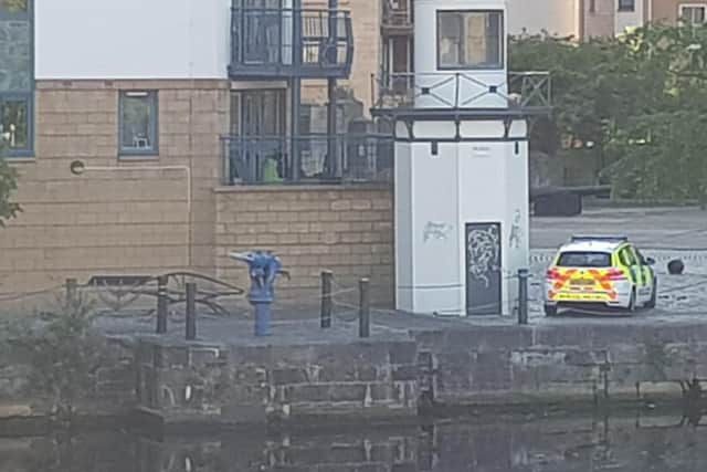 A police car was parked in the area, not far from the incident in Tower Place, Leith. Pic: Christophe Tixier/Edinburgh Crime and Breaking Incidents