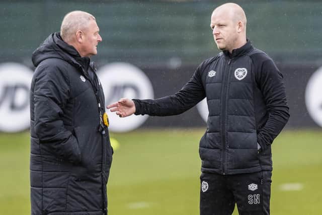 Hearts interim manager Steven Naismith and Frank McAvoy oversee training