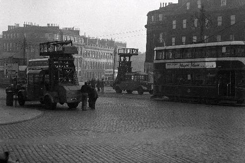 This picture shows a broken down tram by the junction of Leith Walk and London Road around 1950s.