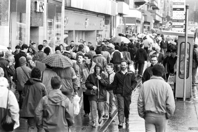 Crowds shopping in Princes Street shop during the Boxing Day sales in Edinburgh 1987.