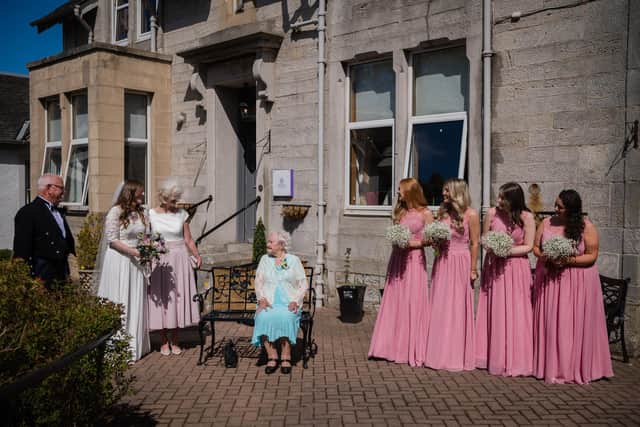 The wedding party visited the care home. Rachel Hein Photography