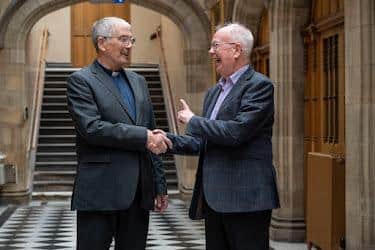 Outgoing Moderator Lord Wallace greets his successor, the Rev Dr Iain Greenshields, at the Assembly Hall.