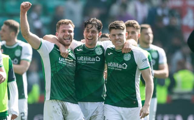 Chris Cadden, Joe Newell and Kevin Nisbet celebrate after the most recent Edinburgh derby victory over Hearts. Picture: SNS