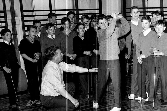 Royal High School pupil William Thomas being given a golf lesson by Jimmy Brash in February 1964.