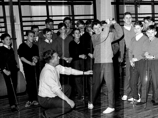 Royal High School pupil William Thomas being given a golf lesson by Jimmy Brash in February 1964.