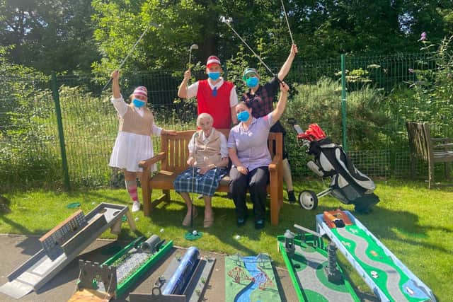 Fore: (L-R) Claire Carson, Callum Arnott, Sarah Cowan, Marjorie, Laura Mitchell.  are enjoying teeing off at a crazy golf course built for them