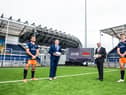 Edinburgh's new ground will be known as the DAM Health Stadium. Edinburgh players Ramiro Moyano, left, and and Jack Blain, right, flank the club's MD Douglas Struth and  DAM Health’s medical director, Professor Frank Joseph.