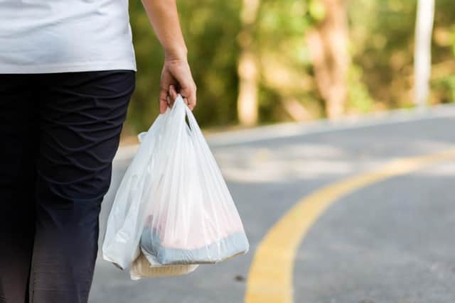 The minimum cost of carrier bags in Scotland will double from April (Shutterstock)