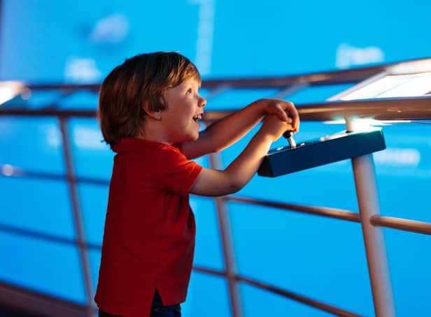 Bruno Massie (3) dives into the underwater world via a spectacular 6 metre by 15-metre-long screen at Dynamic Earth's Discover the Deep exhibition.