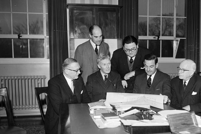 Staff examine plans for George Watson's new music wing in December 1963.