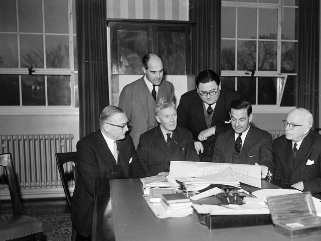Staff examine plans for George Watson's new music wing in December 1963.