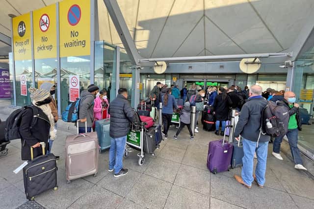 Passengers queuing at Heathrow's Terminal 5 on Saturday. Picture: Jonathan Brady/PA Wire
