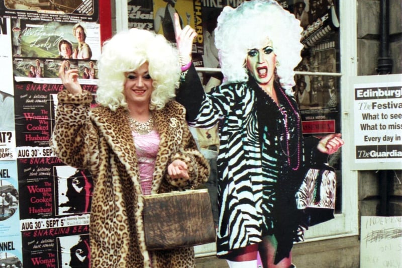The late, great Paul O'Grady, in drag as his alter ego Lily Savage, mimics a cardboard cut-out of himself outside the Assembly Rooms, where he was appearing during the Edinburgh Festival Fringe 1992.