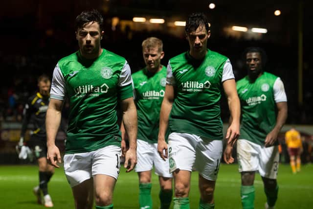 The Hibs players leave the Fir Park pitch during their 0-0 draw with Motherwell. Picture: SNS