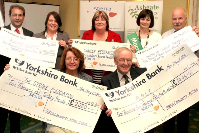 Steria presented charity cheques totalling £13,738 in 2008. L-r: Gillian Brady from the Stroke Association and John Grubb from RNLI, bl-r: Mick Dowson from Steria, Jo Edwards from Ashgate Hospice, Carole Ibbotson, Cancer Research UK and Tracy Townend from Macmillan Cancer support.