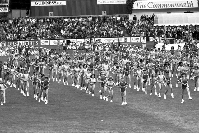 Hundreds of primary school children taking part in the opening ceremony of the Edinburgh Commonwealth Games 1986, held at Meadowbank stadium.