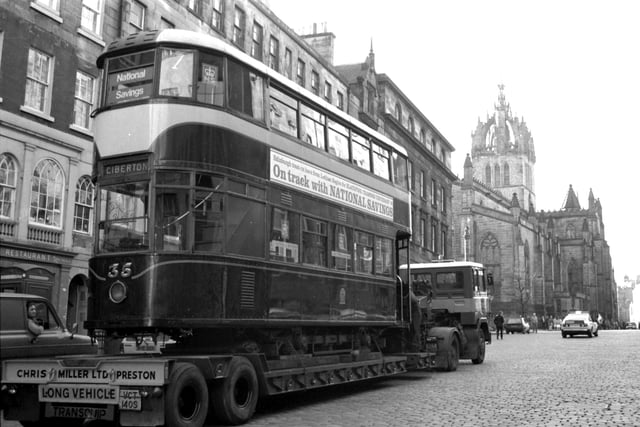 An old No 7 Edinburgh tram can be seen here getting taken to Blackpool on the back of a lorry. Year: 1983