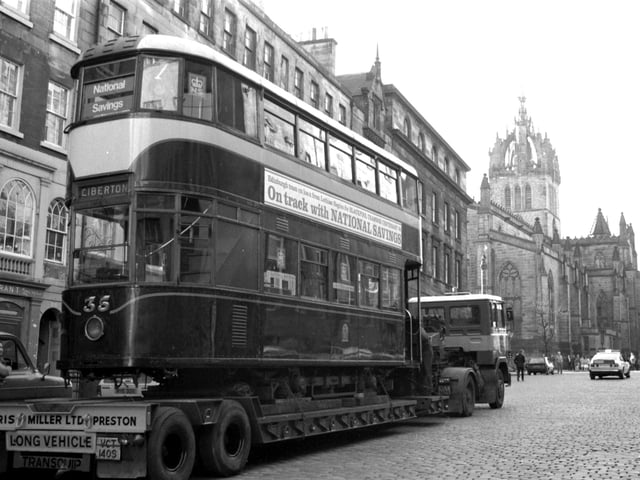 An old No 7 Edinburgh tram can be seen here getting taken to Blackpool on the back of a lorry. Year: 1983