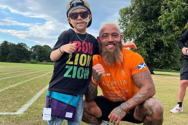 Ashley Cain greeted Rudi after completing a marathon to raise funds for the youngster's treatment in the US