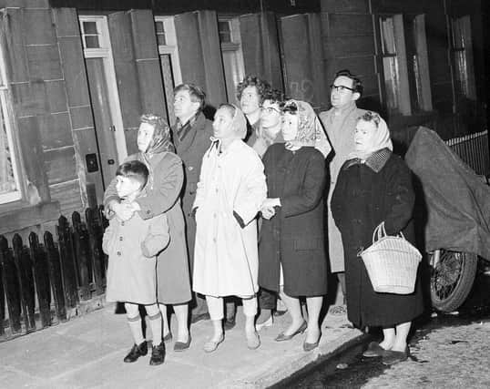 Local residents watch fire engulf the Lyceum Cinema, in Slateford, in May 1963.