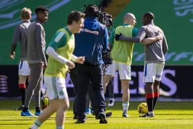 Celtic's Scott Brown, left, embraces Rangers' Glen Kamara before the game between Celtic and Rangers on Sunday (Picture: Craig Williamson/SNS Group)