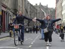 Olympic cyclist Chris Boardman enjoys a car-free day on the Canongate at a city council Open Streets event