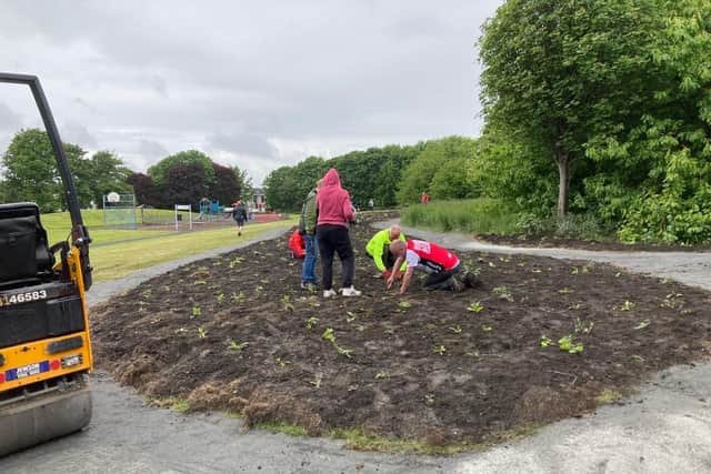 Community members and Hitachi Rail staff moved over 20 tonnes of soil to introduce 1000 plants in the centre of the track to improve biodiversity in the area.