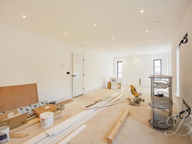 Across the ground floor, the Sheepwalk Lane property offers an abundance of space, as this room shows.