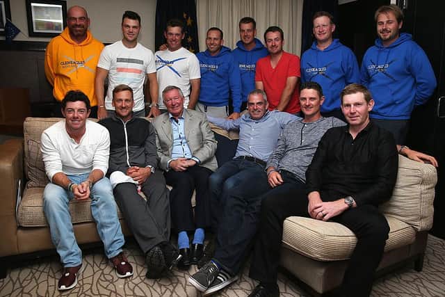 Stephen Gallacher, front right, and his 2014 Ryder Cup team-mates with Sir Alex Ferguson after the former Manchester United manager had delivered a motivational speech for Paul McGinley's side at Gleneagles. Picture: Ross Kinnaird/Getty Images.