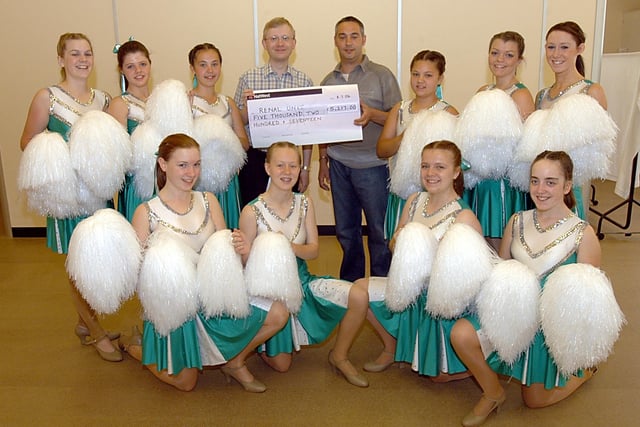 A 2006 show at the Mansfield Palace Theatre where they raised money for local charities.
They presented a cheque for £5,217 to the King's Mill Hospital Renal Unit, £100 to the local SJAB and £100 to the local Sea Scouts.