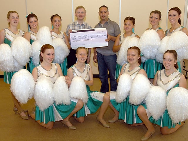 A 2006 show at the Mansfield Palace Theatre where they raised money for local charities.
They presented a cheque for £5,217 to the King's Mill Hospital Renal Unit, £100 to the local SJAB and £100 to the local Sea Scouts.