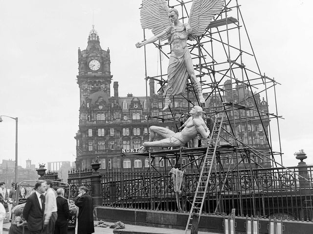 Sir Jacob Epstein's statue of St Michael and the Devil erected on the roof of Waverley Market to promote the Epstein Exhibition during Edinburgh Festival 1961.
