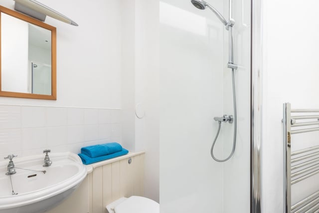 The shower room with skylight. The property also benefits from its own front door, gas central heating and double-glazed sash windows. It provides a conveniently located base in the city centre, ideal as a home or investment purchase.