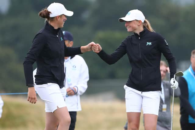 Hannah Darling and Louise Duncan of Team Great Britain and Ireland interact during the Curtis Cup at Conwy. (Photo by Matthew Lewis/R&A/R&A via Getty Images)