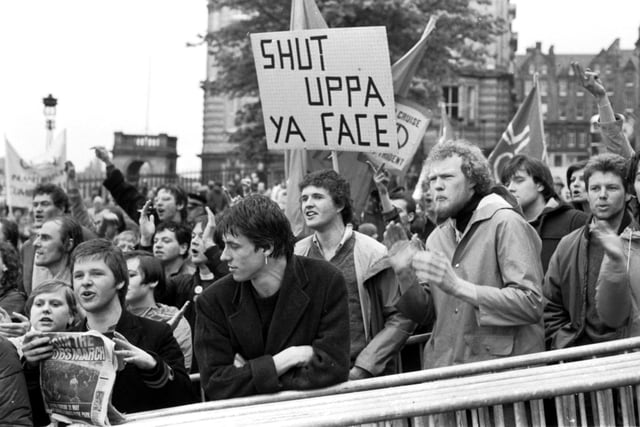 Protesters gathered to protest against Prime Minister Margaret Thatcher when she arrived in Edinburgh to open the General Assembly of the Church of Scotland. Year: 1981