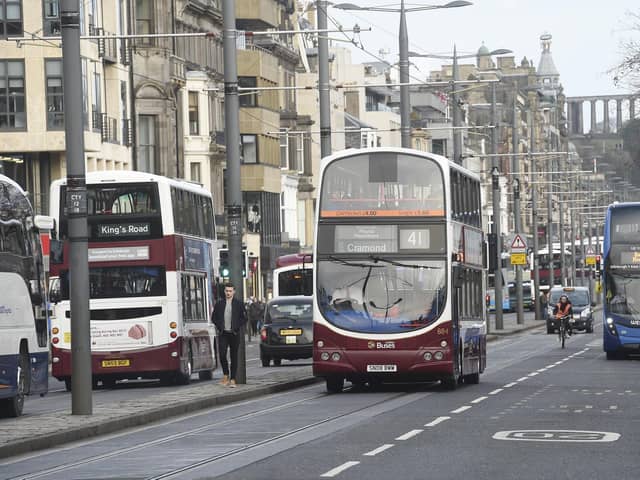 Stock photo by Greg Macvean of buses on Princes Street.