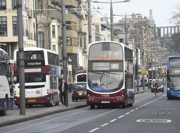 Stock photo by Greg Macvean of buses on Princes Street.