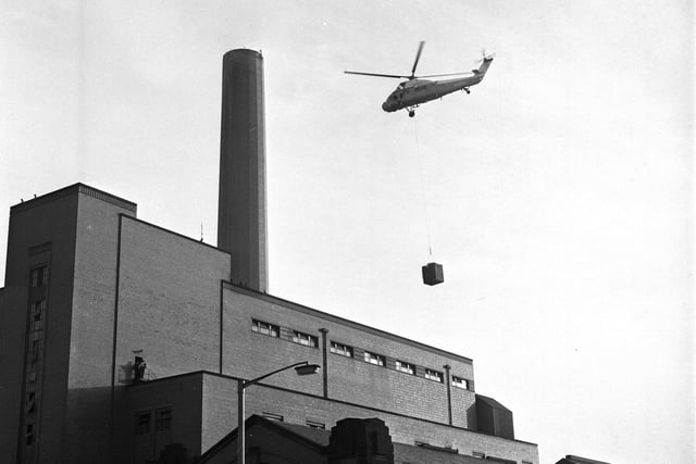 A helicopter delivers a 15ft cooling tower to Portobello power station in December 1970.