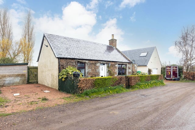 This detached Cottage and detached workshop with accommodation has the potential to form one large property.