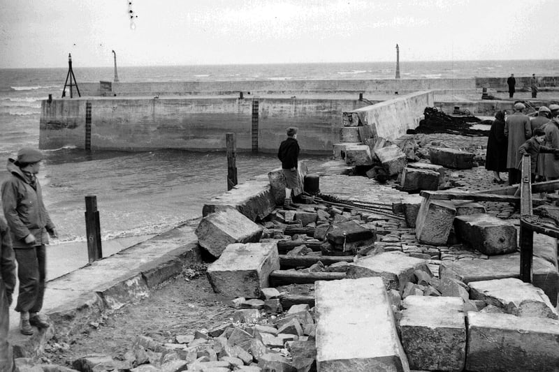 A gale hits Edinburgh seafront in February 1953 . Damage to the seawall at Fisherrow Harbour at Musselburgh.