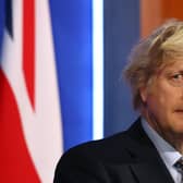 Boris Johnson's government introduced higher rates of National Insurance, paid by everyone, to avoid increasing taxes on the wealthiest (Picture: Hollie Adams/WPA pool/Getty Images)